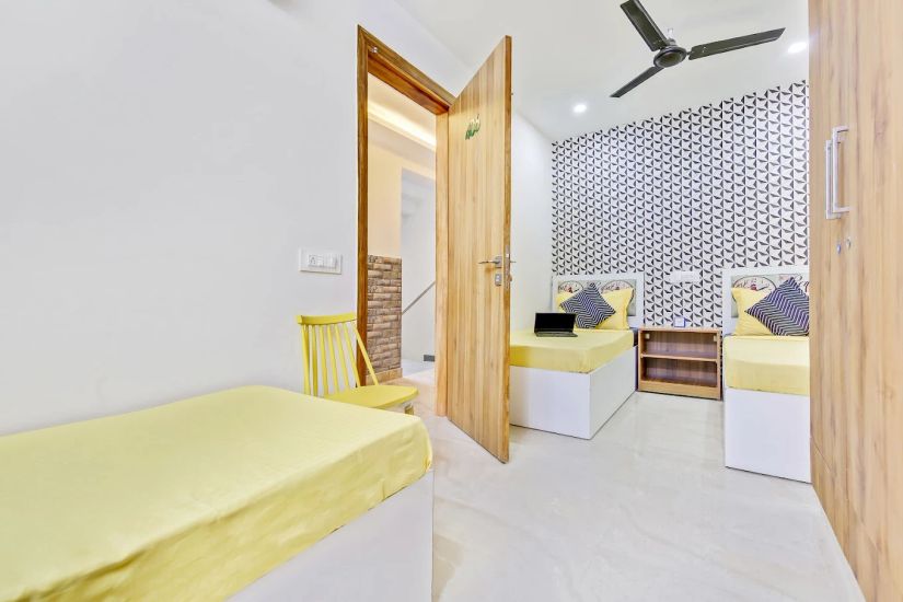 Solitaire Living Girls PG Room Triple Sharing Interior.webp